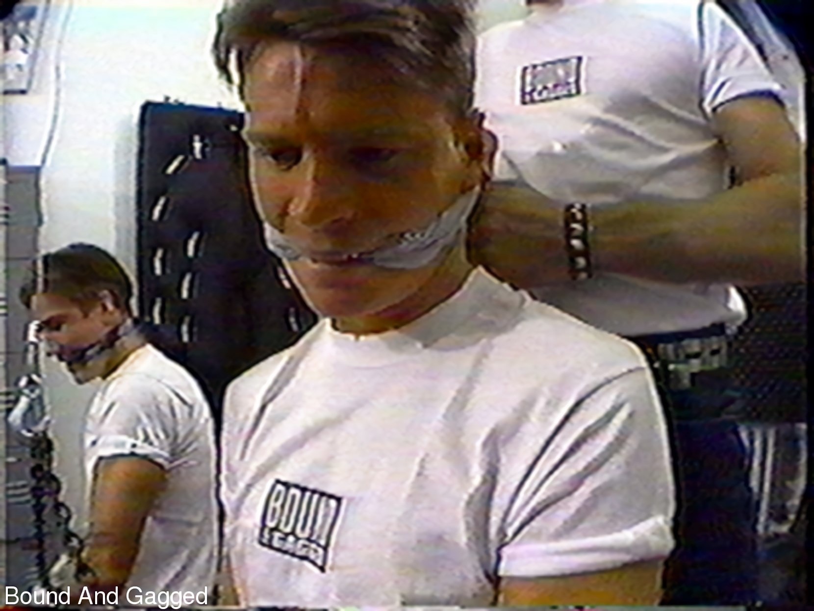 Kink Partners Gay 'Bound and Gagged: The Video - Three Guys Horsing Around' starring Bob Phillips (Photo 1)
