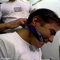Bob Phillips in 'Kink Partners Gay' Bound and Gagged: The Video - Three Guys Horsing Around (Thumbnail 2)