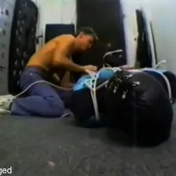 Bob Phillips in 'Kink Partners Gay' BOUND and GAGGED: THE VIDEO - Two guys in wet suits (Thumbnail 9)